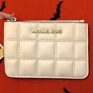 Authentic Michael Kors Ivory Quilted Card Pouch/key chain. New with tag.